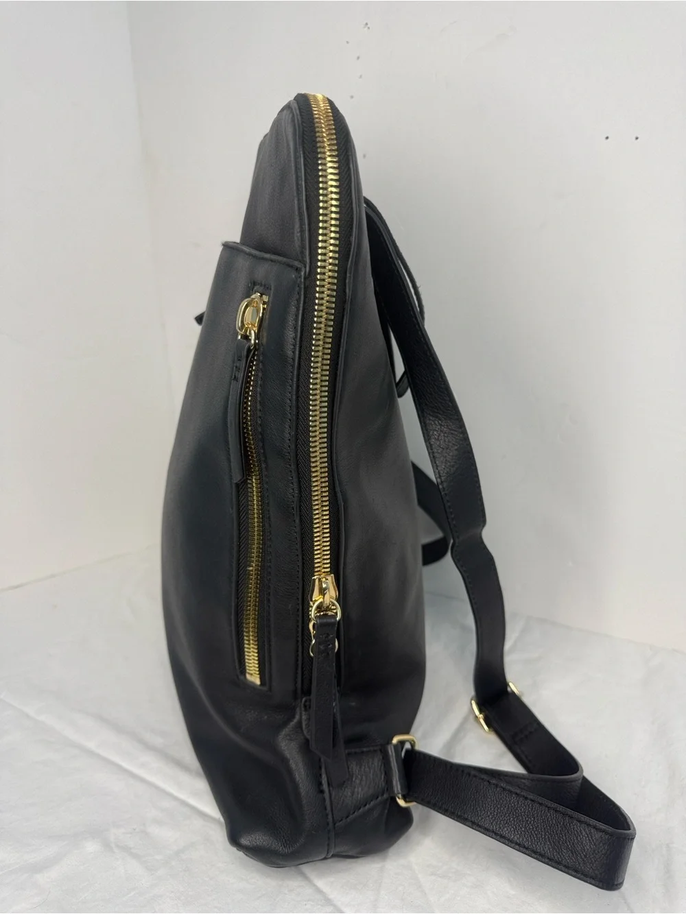 Black Leather Men’s Backpack with Gold Hardware